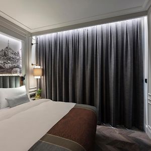 Kamer met een Queen Size Bed
